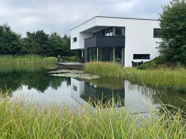 Kauf eines einzigartigen wohnung am See mit privatem Schwimmteich und zwei Häusern