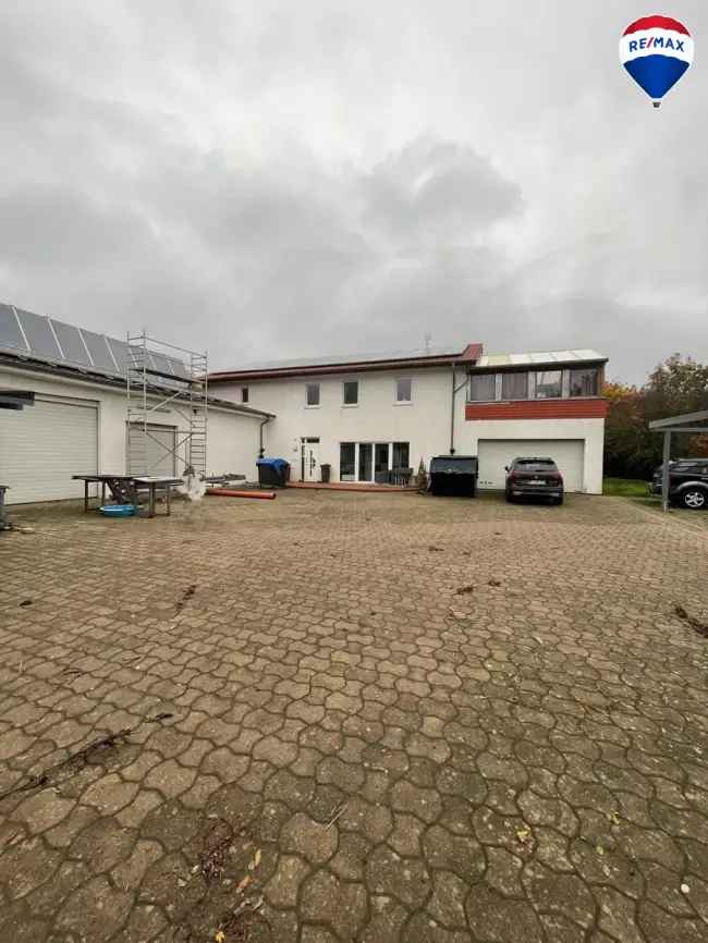 Haus mit Büro + Lager + Halle + Baugrundstück