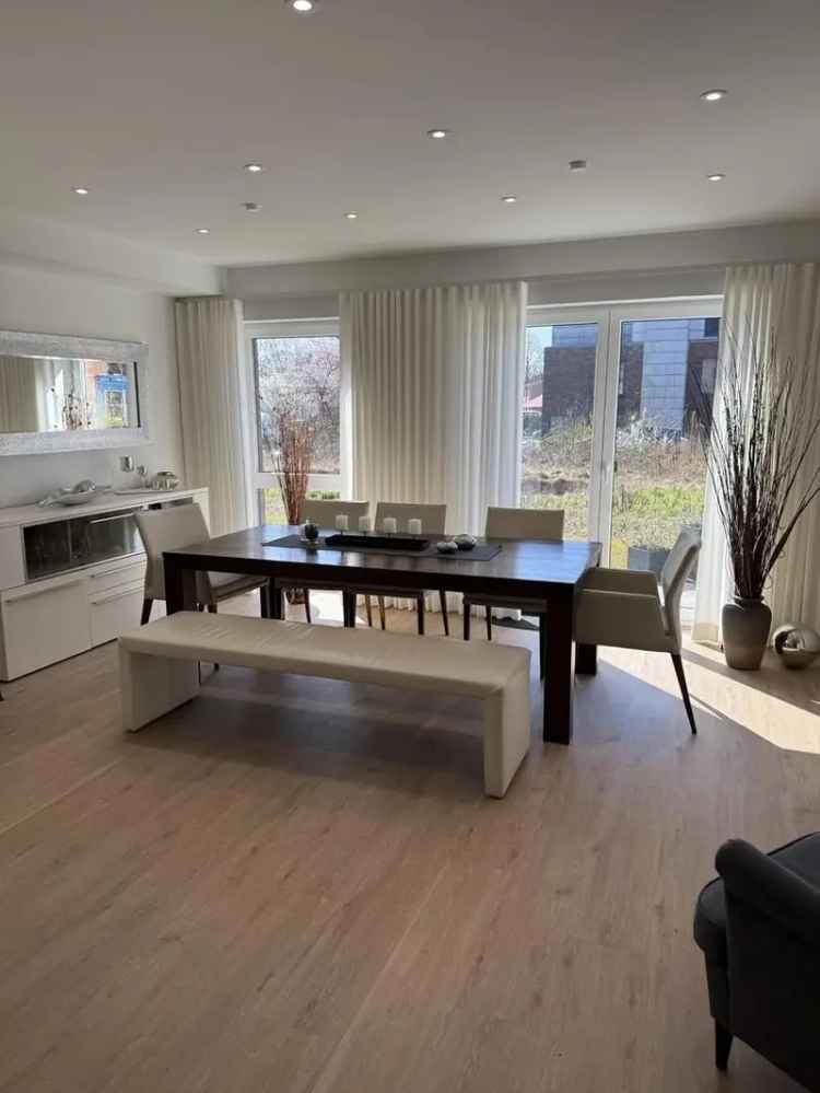 Ulzburg - Exklusive 3-Zimmer Neubauwohnung mit sonniger Terrasse in S/W Ausrichtung