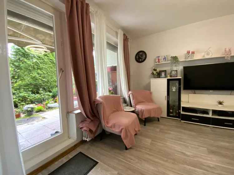 4-Zimmer-Wohnung mit Terrasse und Garten in zentraler Lage