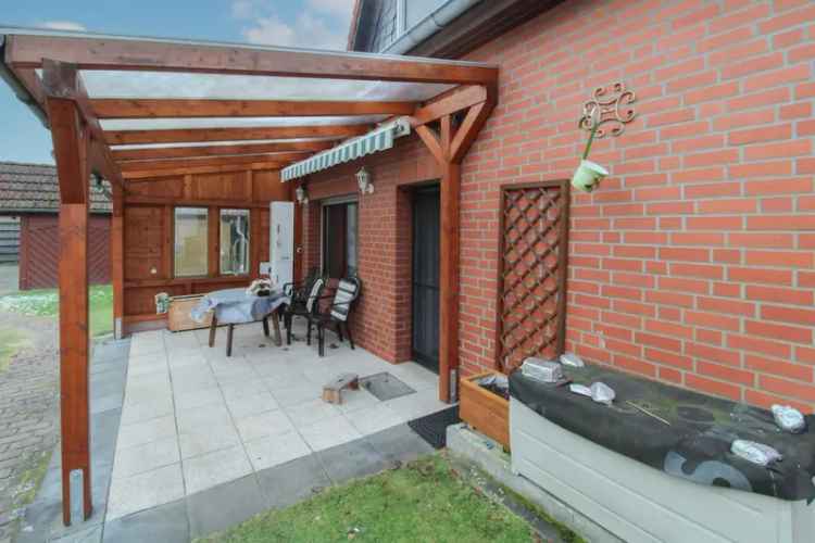 vielseitig nutzbare Immobilie: Einfamilienhaus mit Garten, 2 Terrassen und Doppelcarport