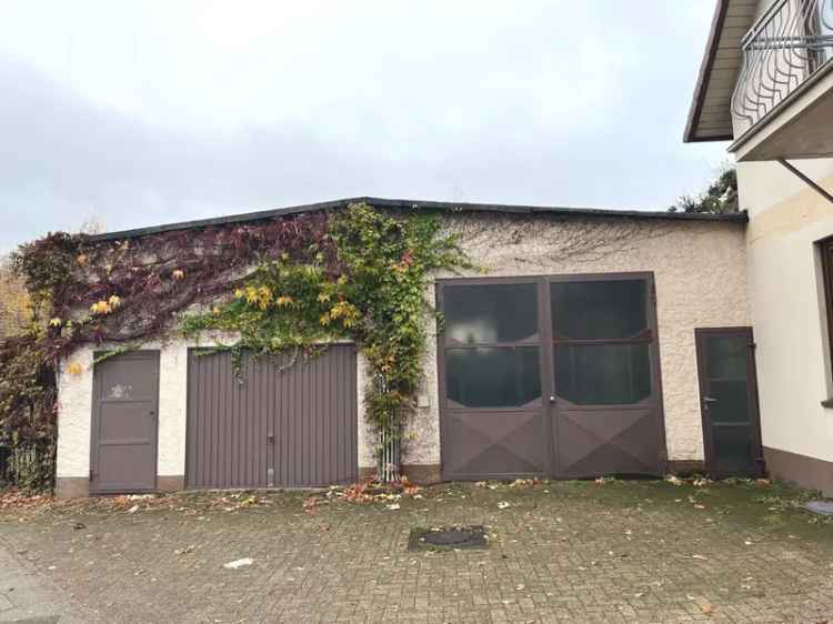 PURNHAGEN-IMMOBILIEN –  Bremen-Blumenthal – großzügiges Wohnhaus mit Halle in zentraler Lage