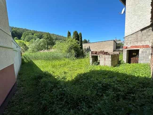 Renovierungsbedürftiges Haus mit Garten und unverbaubarer Aussicht