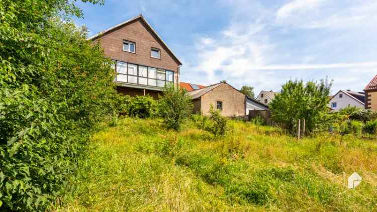 Mehrfamilienhaus mit vier Wohneinheiten, großem Garten und viel Potenzial