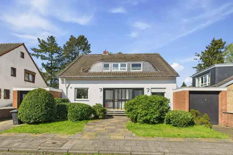 Nähe Königsforst – freistehendes Einfamilienhaus mit Einliegerwohnung, großem Garten & 2 Garagen
