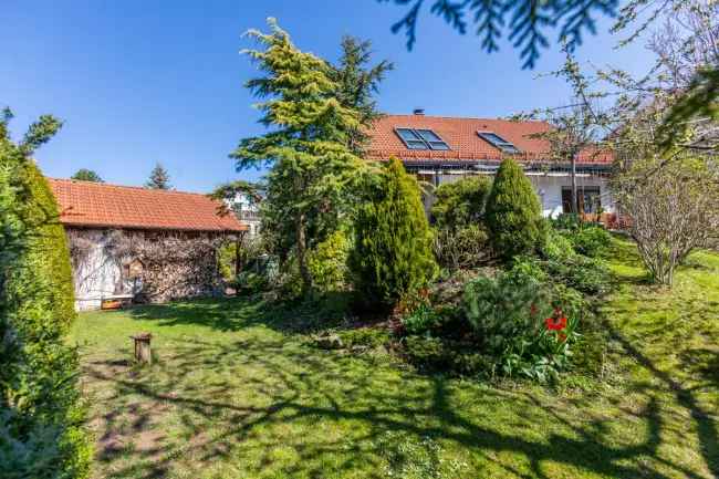 Modernes Einfamilienhaus mit Einliegerwohnung, traumhaften Garten und unverbaubaren Blick