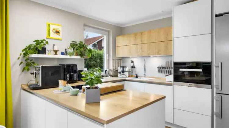 ROGERS: Moderne Wohnoase – Neuwertige Wohnung mit A+ Energiewerten und Garten