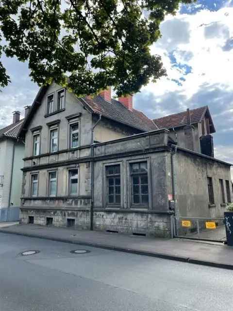 Renovierungsbedürftiges Zweifamilienhaus in Bielefeld mit großem Garten