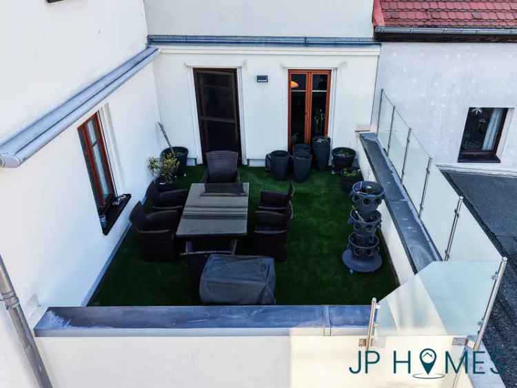 Exklusive 2-Zimmer-Maisonettewohnung mit Dachterrasse