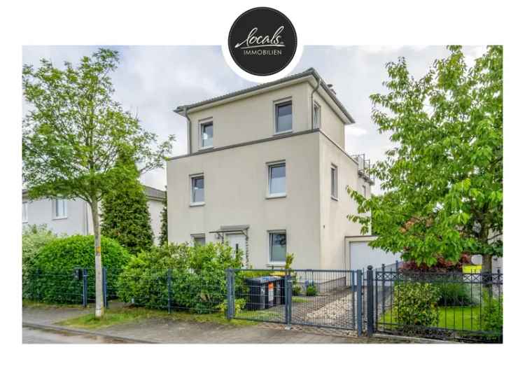 Zeitlose Eleganz: Exklusives Einfamilienhaus in ruhiger Lage mit Garten, Terrassen, Garage und Kamin