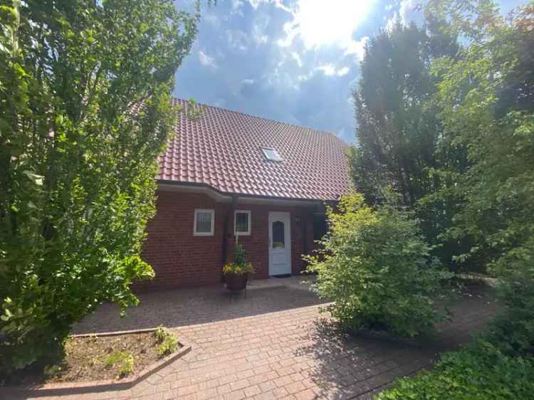 Einfamilienhaus kaufen in Varrelbusch mit großem Garten und Carport