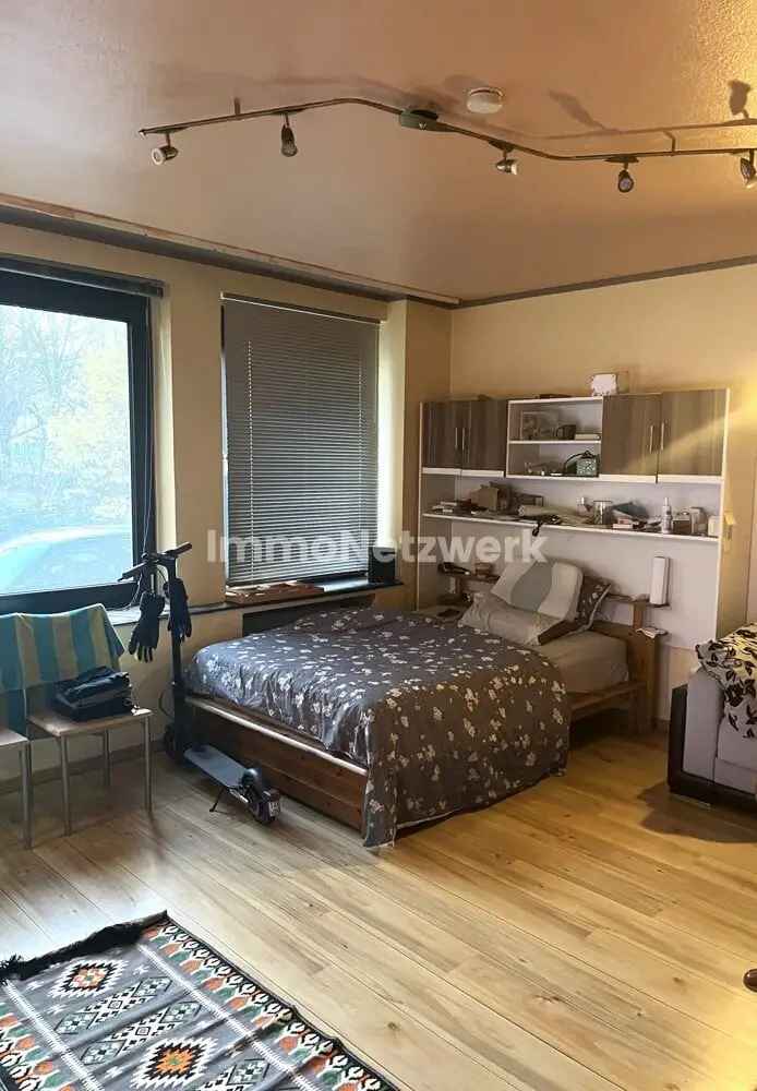 Helles und vermietetes 1 Zimmer-Apartment mit Gartenmitbenutzung in zentraler Wohnlage