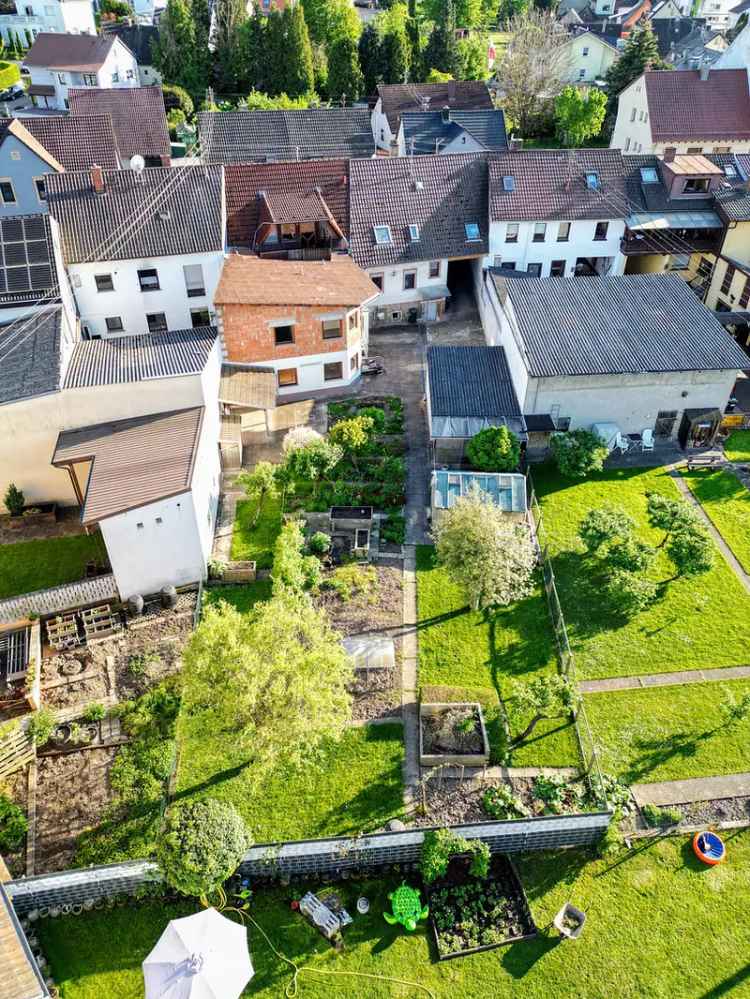 Haushälfte mit Maisonette Wohnung, großer Garten und Gewerbe **OHNE PROVISION**