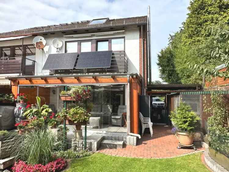 PURNHAGEN-IMMOBILIEN –  Bremen/Bockhorn – Doppelhaushälfte mit Wintergarten und Kamin in ruhiger Lage