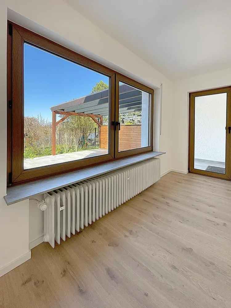 Modernisierte, lichtdurchflutete Wohnung in ruhiger Lage mit Garten, XXL-Terrasse & Einzelgarage