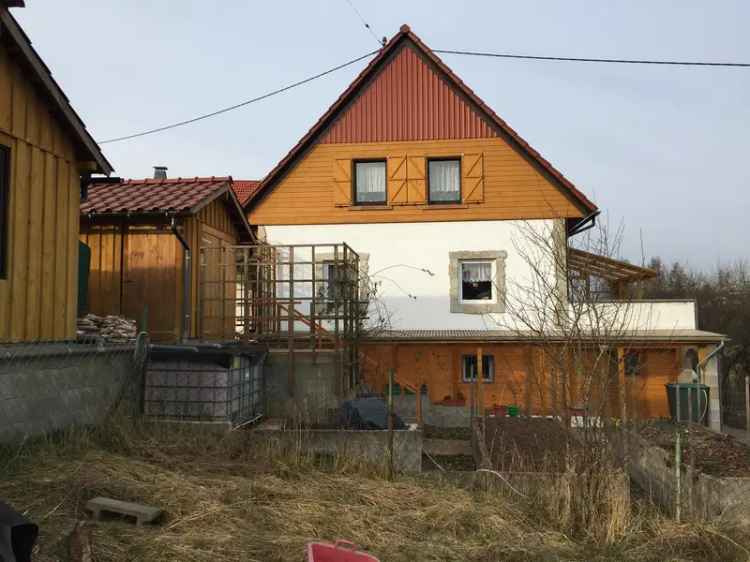 Kaufen Einfamilienhaus in ruhiger Lage mit Garten und Garage