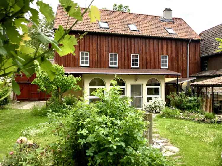 Einfamilienhaus kaufen in romantischem Landhausstil mit Garten