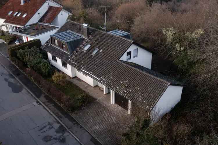 Kaufen Zweifamilienhaus in Panoramalage mit Garten und Doppelgarage