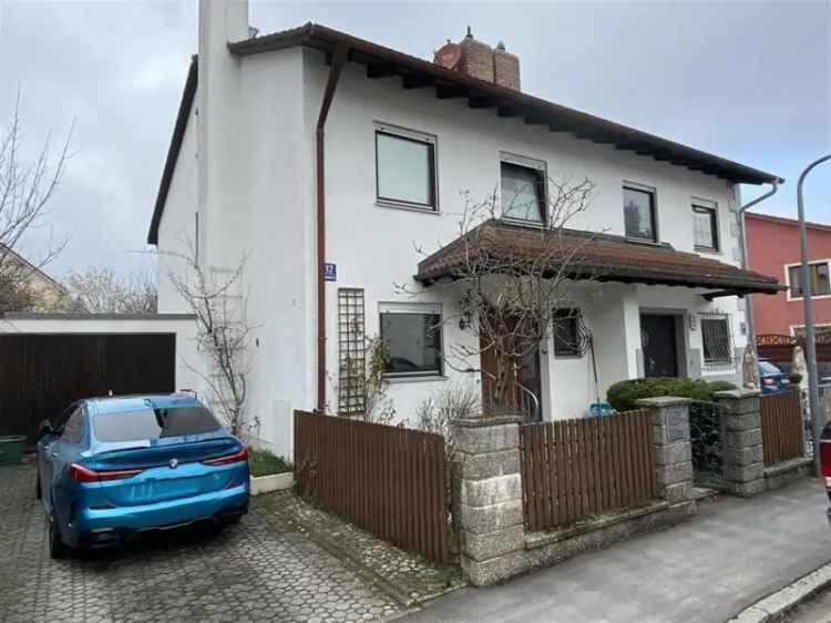 Vermietete Doppelhaushälfte in München mit Garten