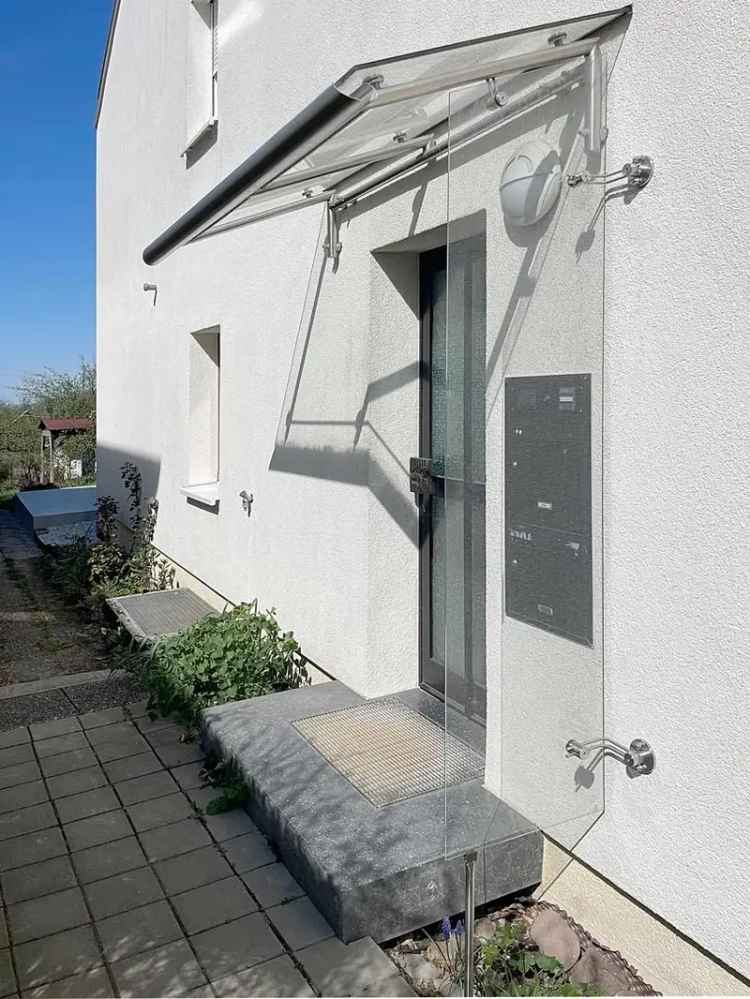 Modernisierte, lichtdurchflutete Wohnung in ruhiger Lage mit Garten, XXL-Terrasse & Einzelgarage