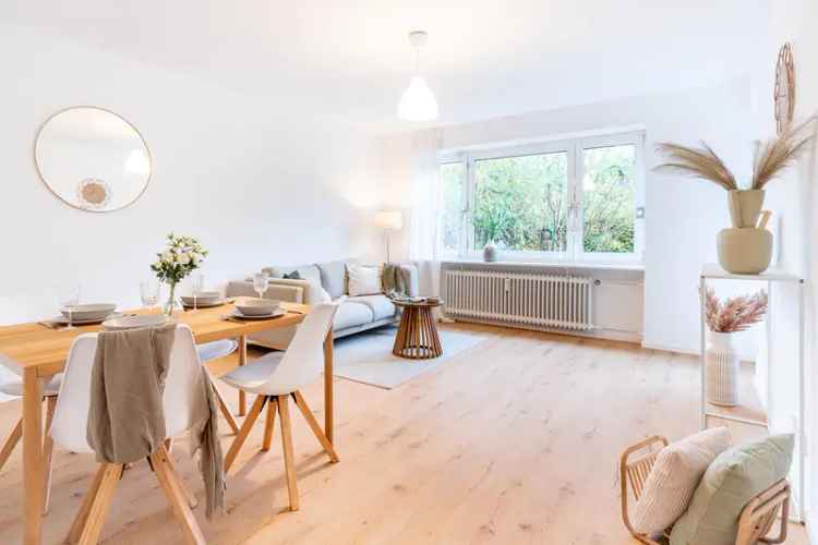 Sanierte Erdgeschosswohnung mit Terrasse in Mehrfamilienhaus