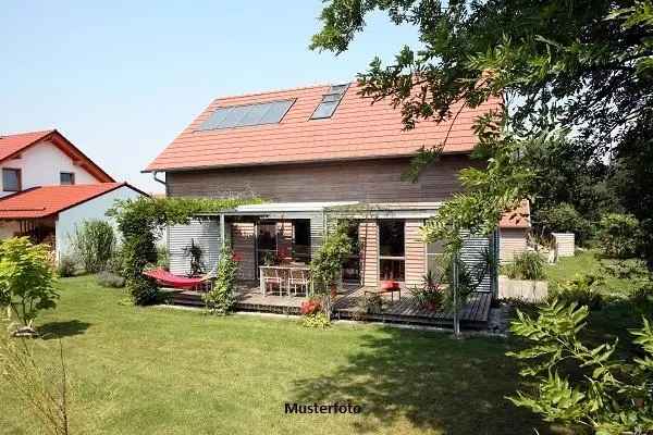 Einfamilienhaus mit Anbau und Garten 112m²