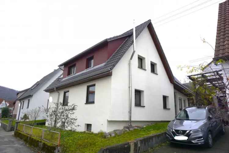 Kaufen Einfamilienhaus in ruhiger Lage mit Garten und Garage