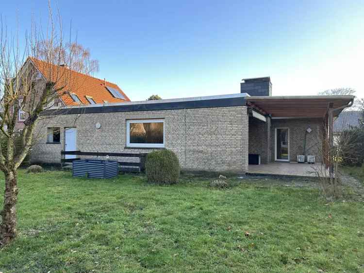 Kauf Bungalow in alteingesessener Wohnsiedlung mit Garten und Garage