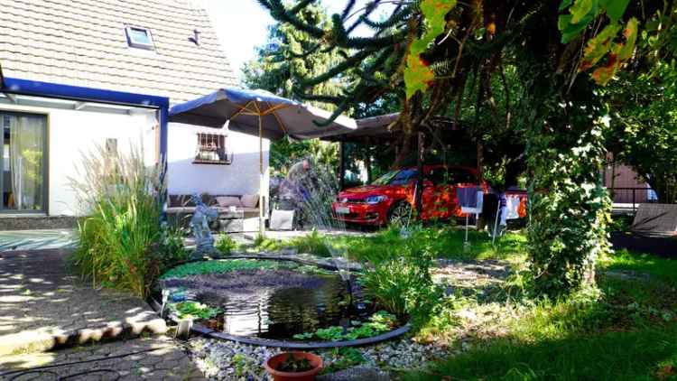 Einfamilienhaus Köln Höhenhaus 77m² Garten Carport Ausbaupotential