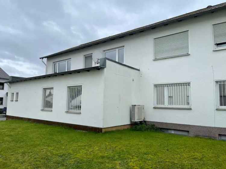 Zweifamilienhaus mit Gewerbeeinheit auf dem Mallendarer Berg