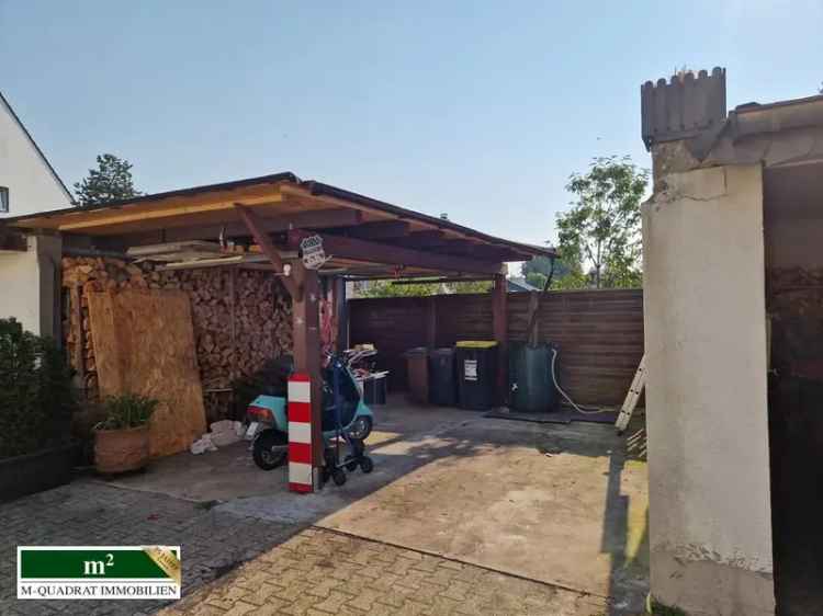 Charmantes Einfamilienhaus mit Einliegerwohnung 4 Garagen und Garten in Köln/Dünnwald