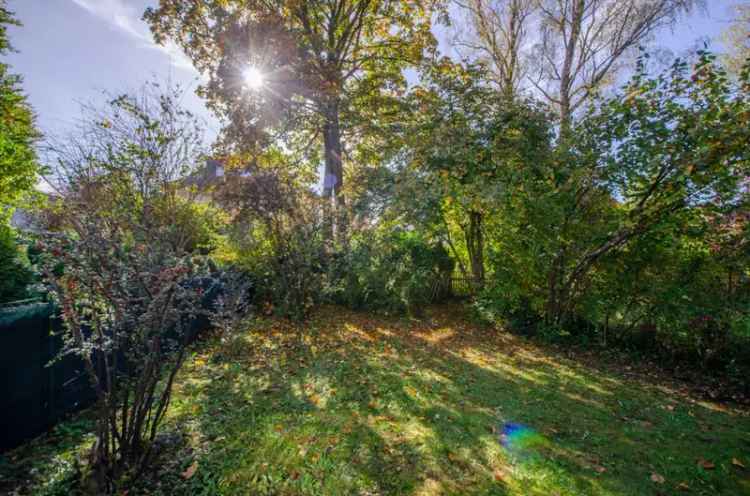 Reihenhaus kaufen in Harlachinger Villenviertel mit Garten für Familien