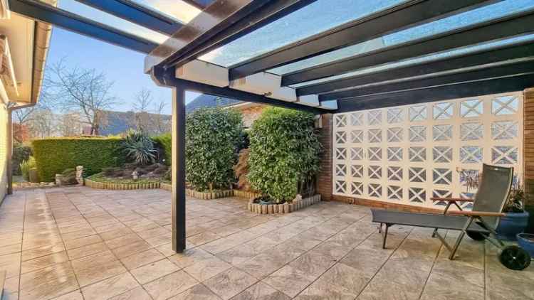 Charmantes freistehendes Einfamilienhaus mit großzügigem Garten, Kamin, Sauna, Partyraum und Garage!