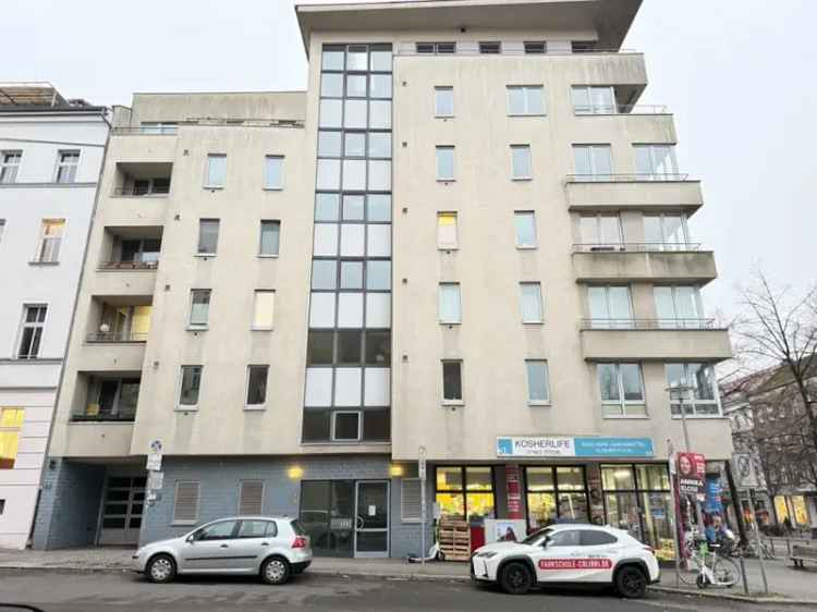 Vermietete Wohnung in zentraler Lage mit Wintergarten und TG-Stellplatz