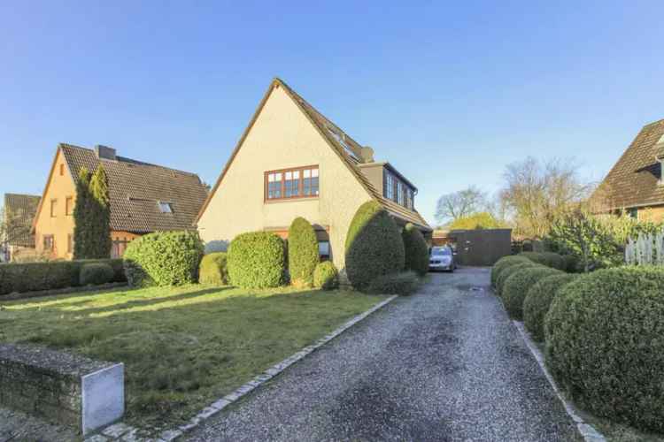 Erdgeschosswohnung kaufen in ruhiger Lage mit Terrasse Garten und Garage