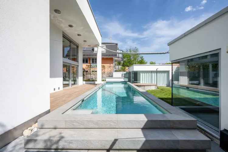 AIGNER - Hochklassiges Architektenhaus: Modernes Einfamilienhaus in Waldperlach