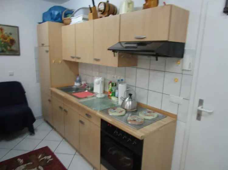 Mieten eines Appartements in bester Lage mit Küche für eine Person