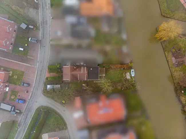 Attraktives Kanalgrundstück mit Abrisshaus in Greetsiel inkl. Baugenehmigung