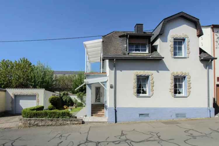 Idyllisches Einfamilienhaus mit sonnigem Garten und Garage in Polch