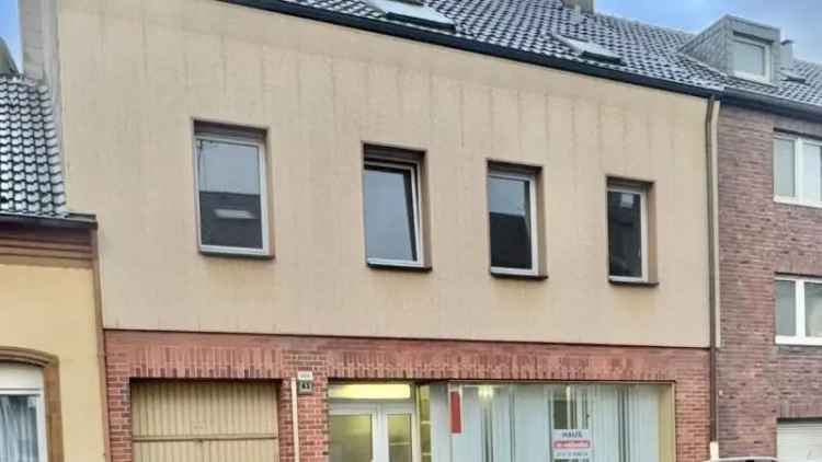 Wohn- und Geschäftshaus in zentraler Lage von Krefeld-Oppum