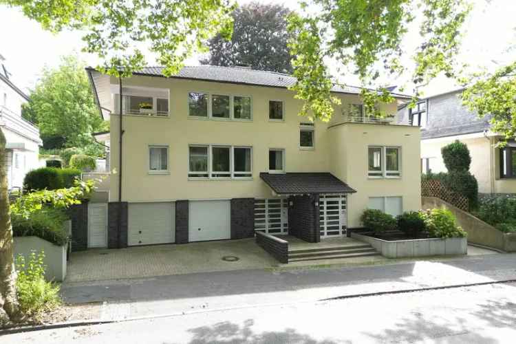 Kaufen Mehrfamilienhaus in Bochum mit unverbautem Parkblick und Garagen