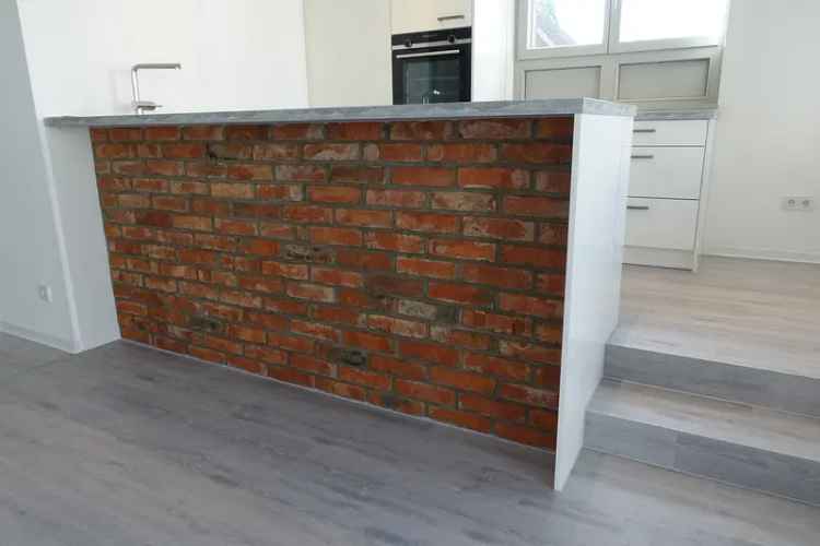 Exklusive & moderne EG-Wohnung am Main mit EBK, riesiger Terrasse, Tageslichtbad, Einbaumöbel