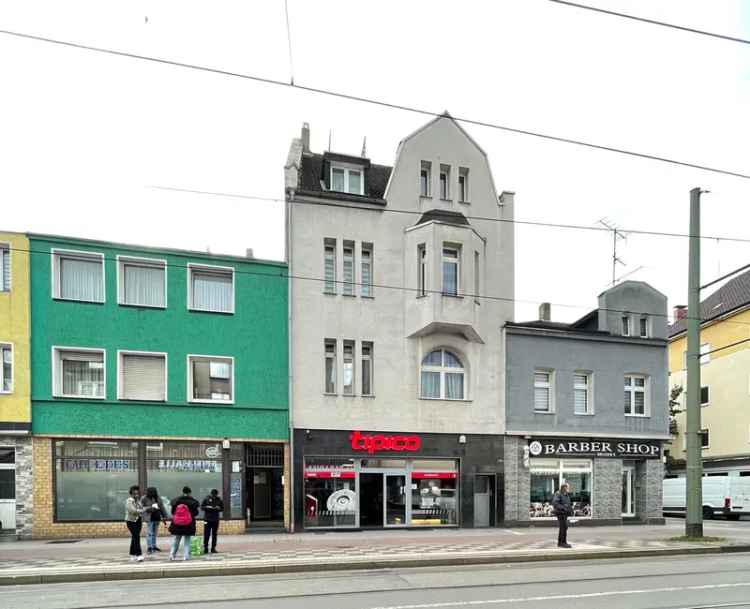 Mehrfamilienhaus mit einer Gewerbeeinheit