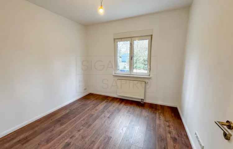MEHRFAMILIENHAUS MIT GUTER RENDITE  UND AUSBAUPOTENZIAL