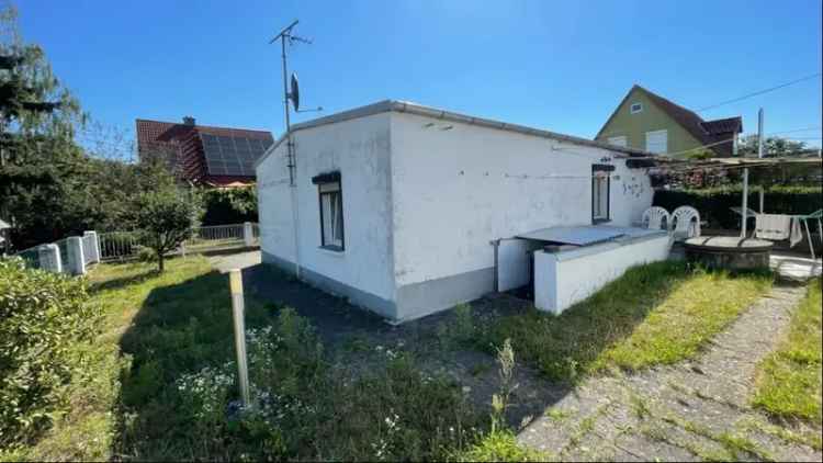 Bungalow kaufen in Weixdorf mit 3 Schlafzimmern und Garage