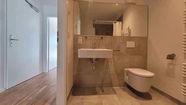 Single Wohnung Neubau 4 Seiten Hof Terrasse EBK Dusche