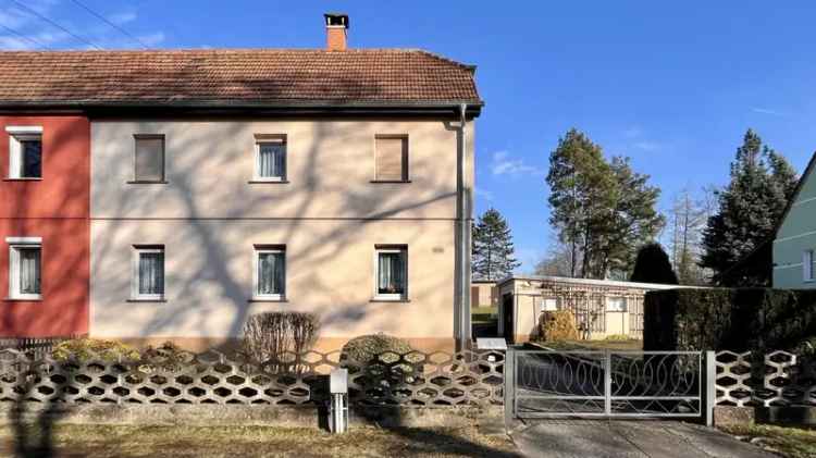 Verkauf Doppelhaushälfte in Dresden mit Wintergarten und großem Grundstück