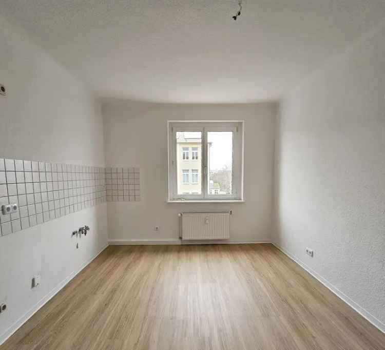 Mieten 2 Zimmer Wohnung in einem Mehrfamilienhaus mit Wohnküche