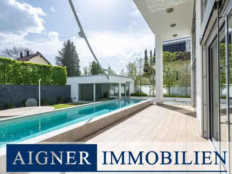 AIGNER Architektenhaus Waldperlach: Modernes Einfamilienhaus mit Gartenpool