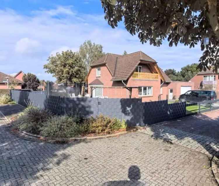 Einfamilienhaus kaufen in ruhiger Wohngegend mit Garten und Garage